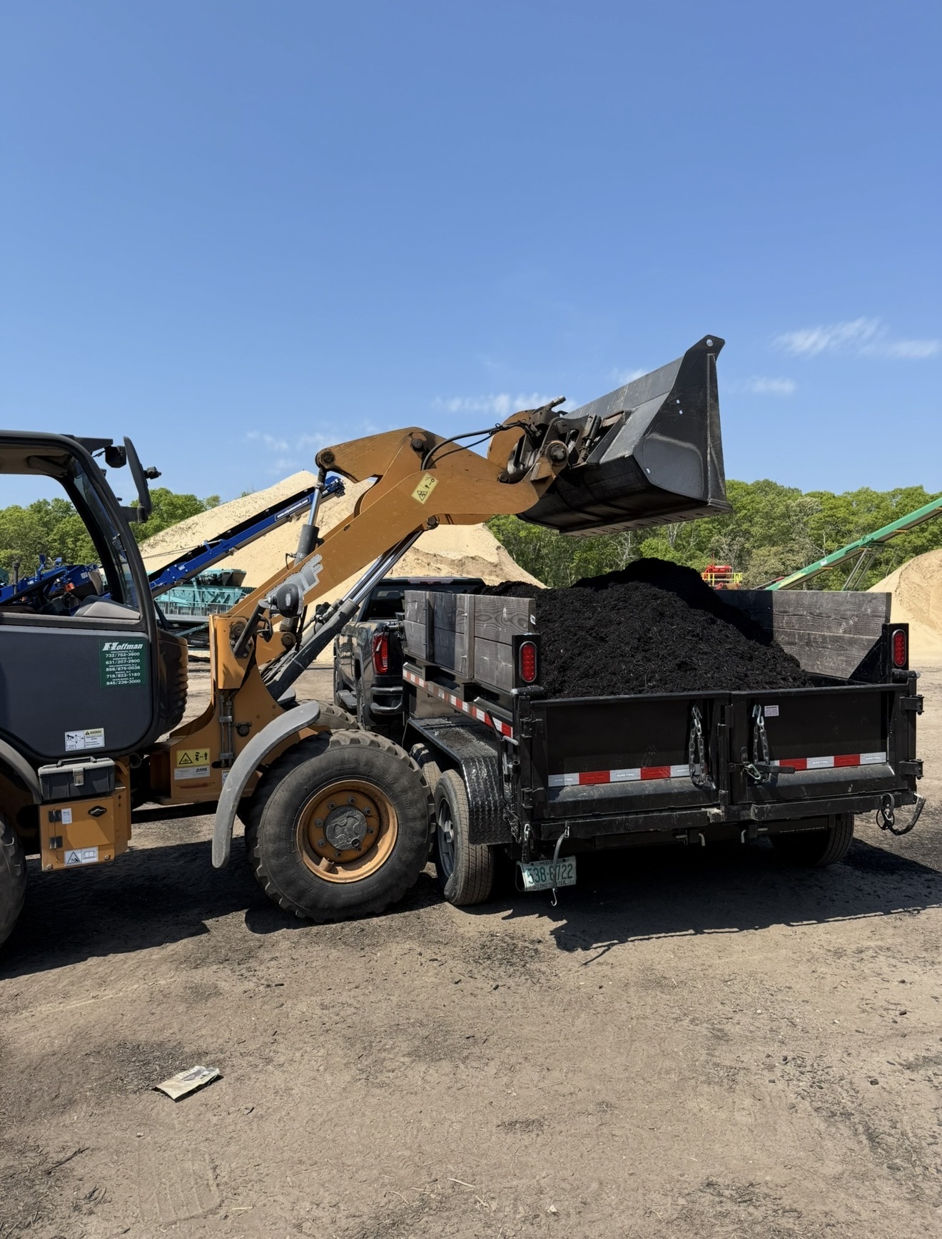 Loading the dump trailer